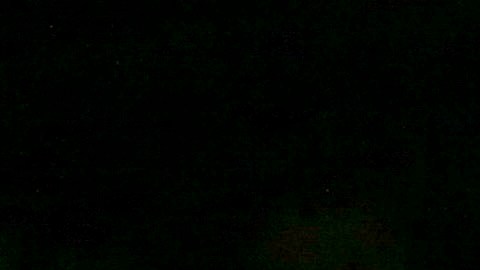 A police officer stands guard inside an area roped off with crime scene tape near a home being investigated by police on Thursday, Dec. 3, 2015, in Redlands, Calif. A heavily armed man and woman opened fire Wednesday on a holiday banquet for his co-workers, killing multiple people and seriously wounding others in a precision assault, authorities said. Hours later, they died in a shootout with police. (AP Photo/Ringo H.W. Chiu)