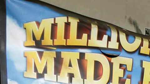 Customers wait in line at the Blue Bird Liquor Store to buy Powerball lottery tickets in Hawthorne, Calif. on Friday, Jan. 8, 2016. Lottery officials confirmed Friday that Saturday nights drawing will be for a record $800 million. The ever-increasing jackpot is a result of strong national sales ever since the jackpot was near $400 million just days ago. (AP Photo/Nick Ut)