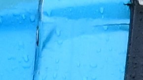 Tourist take cover from the rain on a tour bus, Wednesday, Dec. 24, 2025, in Santa Monica, Calif. (AP Photo/Wally Skalij)