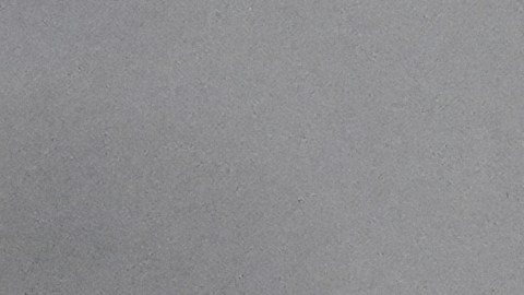 A visitor covers themselves with an umbrella at an overlook at the Griffith Park Observatory during a storm on Tuesday, Oct. 14, 2025, in Los Angeles. (AP Photo/Damian Dovarganes)