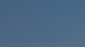 California Highway Patrol officer Matthew Musselmann uses a lidar gun for speed detection along Interstate 5 freeway, Thursday, April 23, 2020, in Anaheim, Calif. The CHP is issuing a lot more tickets to motorists where lanes are wide open during the coronavirus pandemic. From March 19, when the stay-at-home order began, through April 19, officers issued 87% more citations to drivers suspected of speeding in excess of 100 mph. That's compared to the same period last year. The jump in speeding tickets coincides with a 35% decline in traffic volume. (AP Photo/Chris Carlson)