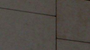 Los Angeles police officers stand alert at the LAPD headquarters in Los Angeles on Tuesday, Feb. 12, 2013. Police are now investigating more than 1,000 tips from the public in the search for the Christopher Dorner, who is suspected of a deadly revenge plot against the Los Angeles Police Department. The number of tips has grown from an initial 250 since the city offered a $1 million reward for information leading to the capture of Dorner. (AP Photo/Nick Ut)