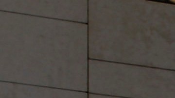 Los Angeles police officers stand alert at the LAPD headquarters in Los Angeles on Tuesday, Feb. 12, 2013. Police are now investigating more than 1,000 tips from the public in the search for the Christopher Dorner, who is suspected of a deadly revenge plot against the Los Angeles Police Department. The number of tips has grown from an initial 250 since the city offered a $1 million reward for information leading to the capture of Dorner. (AP Photo/Nick Ut)