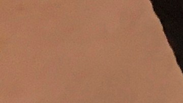 This photo provided by the U.S. Drug Enforcement Administration's Phoenix Division shows some of the 30,000 fentanyl pills the agency seized in one of its bigger busts, in Tempe, Ariz., in August, 2017. The picture shows just one of four plastic containers that were stuffed with the tablets. The Southwest, and Arizona in particular, has become Ground Zero in the nation's fentanyl crisis with plenty of pills and powder staying behind after the drug is repackaged and sent on to New York and other U.S. destinations. Stamped with "M" and "30" like the pain medication oxycodone, the fentanyl-laced pills showed up in recent years as the Sinaloa cartel's newest product. (Drug Enforcement Administration via AP)