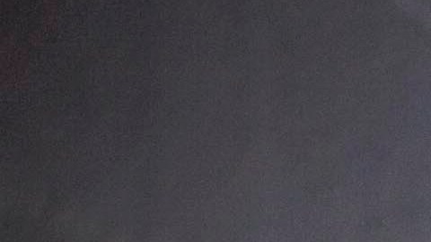 FILE - In this March 3, 2011 file photo, a guard looks on, at right, as prisoners move through the state prison in Jackson, Ga. After years of middling progress, Georgia lawmakers could soon adopt reforms to overhaul the state's clogged, and expensive, prison system. (AP Photo/David Goldman, File)