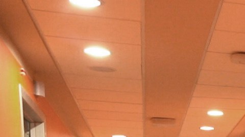 Dr. Paolo Petrassi, the night shift coordinator at Casalpalocco Covid 3 hospital in the outskirts of Rome, walks down a corridor during the new year night, Friday, Jan. 1, 2021. At the Casalpalocco Covid 3 Hospital doctors and nurses barely seemed to register the new year as they tended to 100 patients struggling with serious to critical illness as a result of coronavirus infections. (AP Photo/Andrea Rosa)