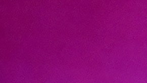 A police officer hangs yellow crime tape at Brown University in Providence, R.I., on Saturday, Dec. 13, 2025, during the investigation of a shooting. (AP Photo/Mark Stockwell)