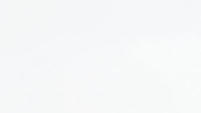 FILE - In this June 22, 2016 file photo, Border Patrol agent Eduardo Olmos walks near the secondary fence separating Tijuana, Mexico, background, and San Diego in San Diego. U.S. President Donald Trump will direct the Homeland Security Department to start building a wall at the Mexican border. (AP Photo/Gregory Bull, file)