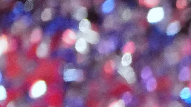 Toluca's Alexis Vega, top, lifts the trophy after winning the Mexican soccer league tournament against Tigres in Toluca, Mexico, Sunday, Dec. 14, 2025. (AP Photo/Eduardo Verdugo)