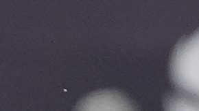 San Diego FC midfielder Hirving Lozano, left, misses a shot on goal as Vancouver Whitecaps defender Édier Ocampo looks on during the first half of an MLS soccer match Saturday, July 19, 2025, in San Diego. (AP Photo/Gregory Bull)