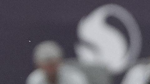 San Diego FC midfielder Hirving Lozano, left, misses a shot on goal as Vancouver Whitecaps defender Édier Ocampo looks on during the first half of an MLS soccer match Saturday, July 19, 2025, in San Diego. (AP Photo/Gregory Bull)