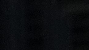 Los Angeles Lakers' Luka Dončić, left, is defended by Golden State Warriors guard Jonathan Kuminga during the first half of an NBA basketball game Tuesday, Oct. 21, 2025, in Los Angeles. (AP Photo/Ethan Swope)