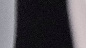 Milwaukee Bucks' Giannis Antetokounmpo, right, and Denver Nuggets' Zeke Nnaji battle for a loose ball during the second half of an NBA basketball game Friday, Jan. 23, 2026, in Milwaukee. (AP Photo/Morry Gash)