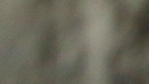 A woman stands outside a school being used as an evacuation center in preparation for Typhoon Hagupit in Legazpi, Albay province, eastern Philippines, Saturday, Dec. 6, 2014. Typhoon Hagupit slammed into the central Philippines' east coast late Saturday, knocking out power and toppling trees in a region where 650,000 people have fled to safety, still haunted by the massive death and destruction wrought by a monster storm last year. (AP Photo/Aaron Favila)