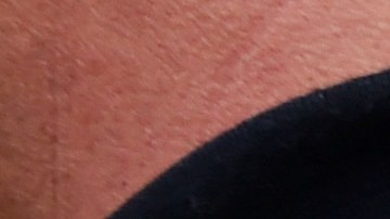 Pedestrians crossing from Mexico into the United States at the Otay Mesa Port of Entry wait in line Thursday, Dec. 10, 2015, in San Diego. On Thursday, U.S. Customs and Border Protection began capturing biometric facial and eye scans of foreigners entering the country at San Diego's Otay Mesa port of entry on foot. (AP Photo/Denis Poroy)