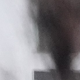 Federal agents stand outside a warehouse as federal officials tour the facility to consider repurposing it as an ICE detention facility, Thursday, Jan. 15, 2026, in Kansas City, Mo. (AP Photo/Charlie Riedel)