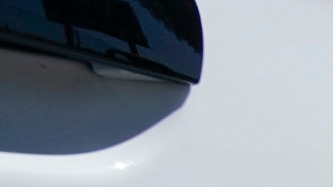 FILE - In this April 23, 2020, file photo, a California Highway Patrol officer stops a motorist in Anaheim, Calif. California Attorney General Rob Bonta announced, Thursday, July 8, 2021, that six officers working out of East Los Angeles, have been criminally charged for exaggerating their overtime hours while providing protection for state highway workers during road construction projects. (AP Photo/Chris Carlson, File)