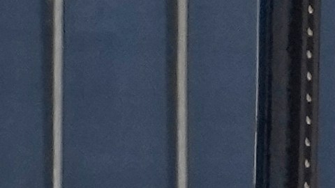 A member of the NYPD bomb squad examines the cab of a rental truck that was stopped and the driver arrested, Monday, Feb. 13, 2023, in New York. Police stopped a U-Haul truck and detained the driver after reports that the vehicle struck multiple pedestrians in New York City on Monday. Authorities say the driver of the truck fled the scene after mounting a sidewalk in the Bay Ridge neighborhood of Brooklyn and injuring several people. (AP Photo/John Minchillo)