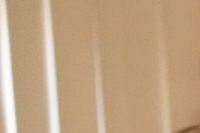 Kaden Rummler, who was injured after being hit with a projectile fired by a federal agent during a protest outside an immigration building in Santa Ana, Calif., plays the bass at home Wednesday, Jan. 14, 2026, in Southern California. (AP Photo/Damian Dovarganes)