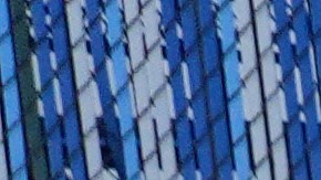 A demonstrator smashes a piñata in the shape of an ICE agent during a protest to denounce the Trump administration's immigration enforcement polices Friday, Jan. 16, 2026, in Los Angeles. (AP Photo/Jae C. Hong)