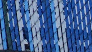 A demonstrator smashes a piñata in the shape of an ICE agent during a protest to denounce the Trump administration's immigration enforcement polices Friday, Jan. 16, 2026, in Los Angeles. (AP Photo/Jae C. Hong)