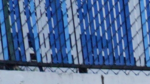 A demonstrator smashes a piñata in the shape of an ICE agent during a protest to denounce the Trump administration's immigration enforcement polices Friday, Jan. 16, 2026, in Los Angeles. (AP Photo/Jae C. Hong)