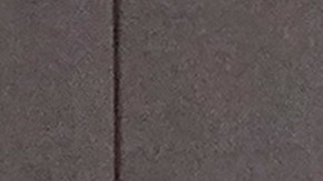 FILE - In this Jan. 5, 2021, file photo, emergency medical technicians sanitize an ambulance stretcher after transporting a patient at Los Angeles County + USC Medical Center in Los Angeles. The U.S. registered its highest deaths yet from the coronavirus on the same day as a mob attack on the nation’s capitol laid bare some of the same, deep political divisions that have hampered the battle against the pandemic. (AP Photo/Damian Dovarganes, File)