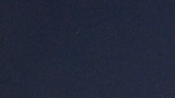 Protesters gather during a demonstration in front of the Metropolitan Detention Center calling for an end to federal immigration enforcement operations and U.S. attacks on Venezuela, Saturday, Jan. 10, 2026, in Los Angeles. (AP Photo/Jill Connelly)