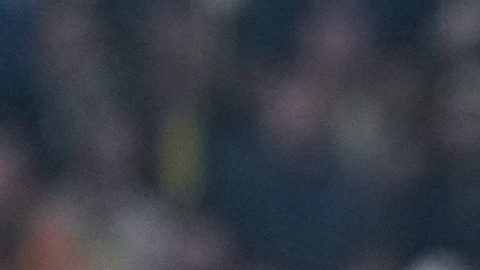 Galatasaray's Victor Osimhen, right, tussles for the ball with Fenerbahce's Edson Alvarez during a Turkish Super Lig soccer match between Fenerbahce and Galatasaray, in Istanbul, Turkey, Monday, Dec. 1, 2025. (AP Photo/Khalil Hamra)