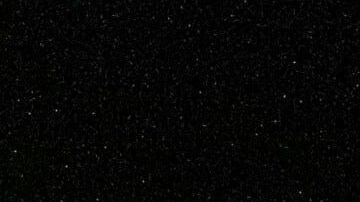 The Olympic rings are lit up during the Olympic opening ceremony at the 2026 Winter Olympics, in Milan, Italy, Friday, Feb. 6, 2026. (AP Photo/Natacha Pisarenko)