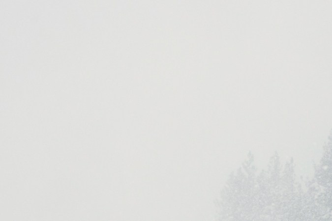 Motorists drive on a snow-covered road during a storm on Tuesday, Feb. 17, 2026 in Truckee Calif. (AP Photos/Brooke Hess-Homeier)