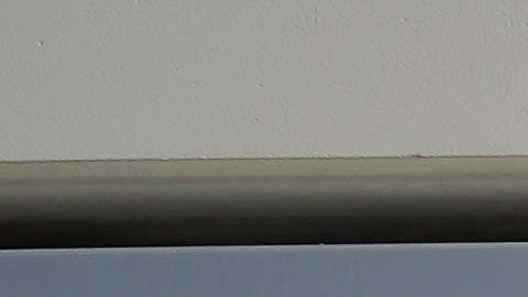 Kaiser Permanente health care workers hold signs and chant slogans while on strike in front of the Los Angeles Kaiser Medical Center in Los Angeles, Wednesday, Oct. 15, 2025. (AP Photo/Damian Dovarganes)