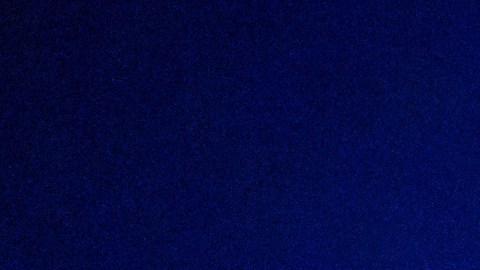 A police car drives through an intersection during a protest in downtown Los Angeles on Friday, Jan. 30, 2026. (AP Photo/Ethan Swope)