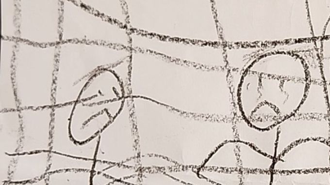 Fotografía cedida por el abogado Eric Lee de un dibujo que dice "tengo cinco años, déjenos salir".