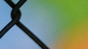 A chain-link fence lock is seen on a gate at a closed Ranchito Elementary School in the San Fernando Valley section of Los Angeles on Monday, July 13, 2020. Amid spiking coronavirus cases, Los Angeles Unified School District campuses will remain closed when classes resume in August, Superintendent Austin Beutner said Monday. (AP Photo/Richard Vogel)