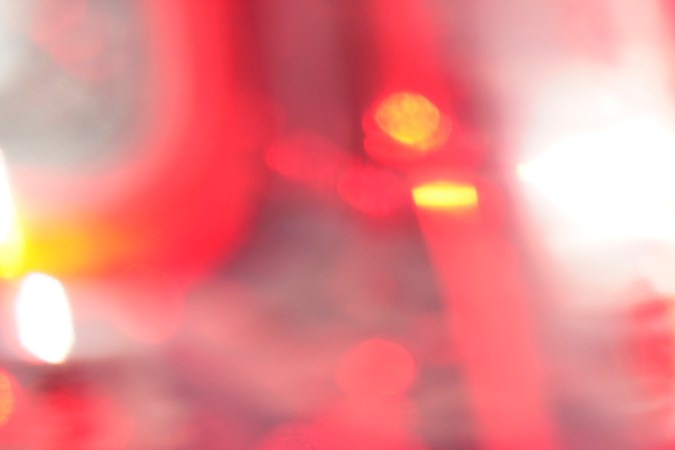 U.S. Immigration and Customs Enforcement agents transfer an immigrant after an early morning raid in Duarte, Calif., Monday, June 6, 2022. This weekend, the Biden administration said it would suspend an order prioritizing the arrest and deportation of immigrants considered a threat to public safety and national security in order to comply with a ruling earlier in June 2022 from a Texas judge. (AP Photo/Damian Dovarganes)