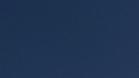 A member of Iraq's national skydiving team parachutes during a training session in Kut, 100 miles (160 kilometers) southeast of Baghdad, Iraq, Friday, Oct. 13, 2015. (AP Photo/Hadi Mizban)