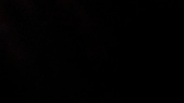 People light candles during a commemoration ceremony for victims of the 1932-33 Great Famine in Kiev, Ukraine, Saturday, Nov. 26, 2011. Church bells tolled, candles flickered and national flags, adorned with black ribbons, flew in the Ukrainian capital Kiev Saturday as the country marked the anniversary of the start of a Soviet-era famine that killed millions. (AP Photo/Efrem Lukatsky)