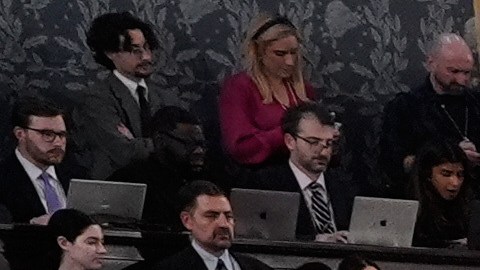 Republican members of Congress stand while Democrats keep their seats during President Donald Trump's State of the Union address to a joint session of Congress in the House chamber at the U.S. Capitol in Washington, Tuesday, Feb. 24, 2026. (AP Photo/Alex Brandon)