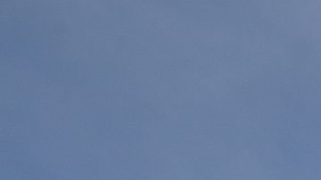 Romanian servicemen walk next to an US Army 2nd Battalion, 10th Regiment, 10th Brigade UH-60 Blackhawk helicopter during a joint US-Romanian air assault exercise at the Mihail Kogalniceanu airbase, eastern Romania, Wednesday, March 8, 2017. (AP Photo/Vadim Ghirda)