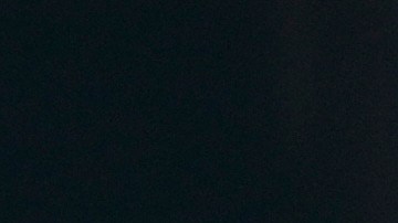 Los Angeles Dodgers' Miguel Rojas (72) high fives his teammates after scoring during spring training baseball game against the Cleveland Guardians, Tuesday, Feb. 24, 2026, in Phoenix. (AP Photo/Brynn Anderson)