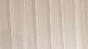 In this photo supplied by Australia's Minister for Home Affairs Tony Burke's office, the Minister Tony Burke, center, poses in an undisclosed location with five Iranian women soccer players who have been granted asylum in Australia, Tuesday, March 10, 2026. (Australia Ministry of Home Affairs via AP)