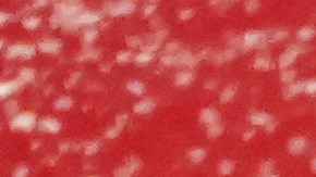 Ferrari driver Charles Leclerc of Monaco dons his helmet for the first practice session at the Japanese Formula One Grand Prix in Suzuka, Japan, Friday, March 27, 2026. (AP Photo/Eugene Hoshiko)