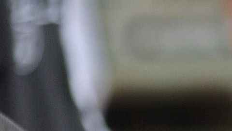 FILE - Oakland Raiders center Barret Robbins smiles on the bench during the Raiders' 34-31 overtime win over the San Diego Chargers in an NFL football game, Sunday, Sept. 28, 2003 in Oakland, Calif. (AP Ptoto/Paul Sakuma, File)