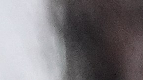 Federal agents stand outside a warehouse as federal officials tour the facility to consider repurposing it as an ICE detention facility, Thursday, Jan. 15, 2026, in Kansas City, Mo. (AP Photo/Charlie Riedel)