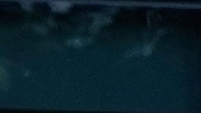 A student walks past a statue of César Chavez which has been covered with plywood at California State University, Fresno in Fresno, Calif., Wednesday, March 18, 2026. (AP Photo/Godofredo A. Vásquez)