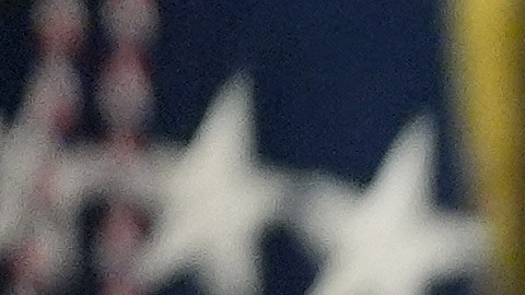 Homeland Security Secretary Kristi Noem listens as President Donald Trump speaks during a meeting with the White House task force on the 2026 FIFA World Cup in the Oval Office of the White House, Monday, Nov. 17, 2025, in Washington. (AP Photo/Evan Vucci)