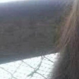 María Estrada (derecha) y su hija Damaris.