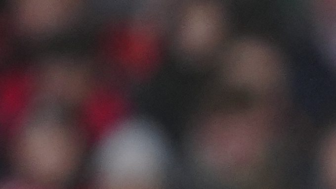 Ajax's Edgar Davids gets the captain's armband from Jari Litmanen during an exhibition soccer match between Liverpool Legends and Ajax Legends at Anfield Stadium, Liverpool, England, Saturday March 23, 2024. Former England boss Eriksson, who is a lifelong Liverpool fan, disclosed his terminal cancer diagnosis in January. (AP Photo/Jon Super)