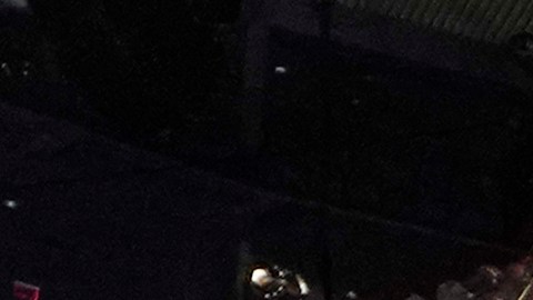 FILE - Wrestling fans, under a Wrestlemania sign, watch a WWE Monday Night RAW event, March 6, 2023, in Boston. This year's WrestleMania may be just days away, but the marketing run up to WWE's biggest premium live event went into overdrive months ago. (AP Photo/Charles Krupa, File)